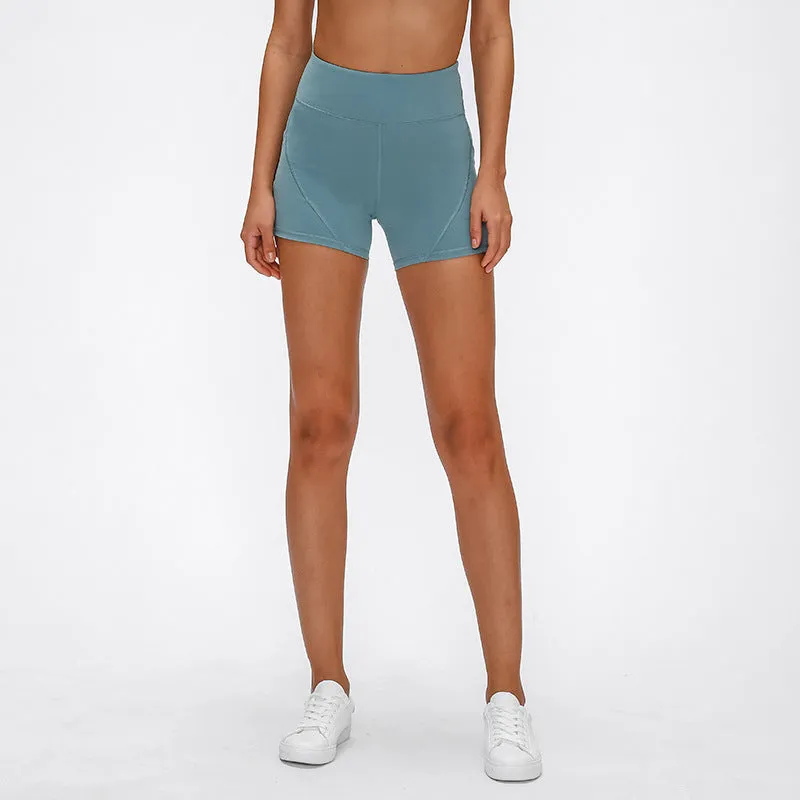 SHINBENE women's high waisted athletic shorts in black with two side pockets and cotton feel nylon spandex fabric