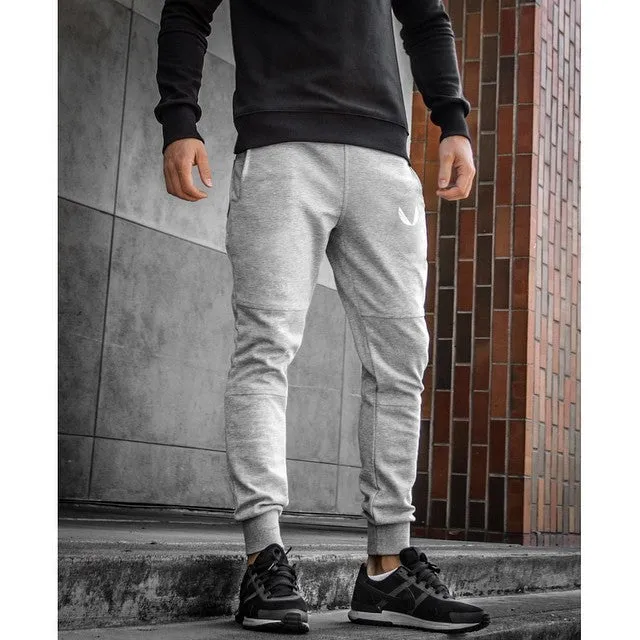 Men's cotton running training pants with drawstring waist and ribbed hem in dark grey, straight tube leg style