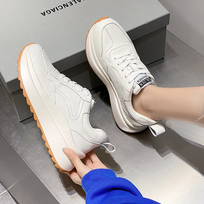 Women's beige cattlehide leather low-top casual sports shoes with cross strap and round toe.
