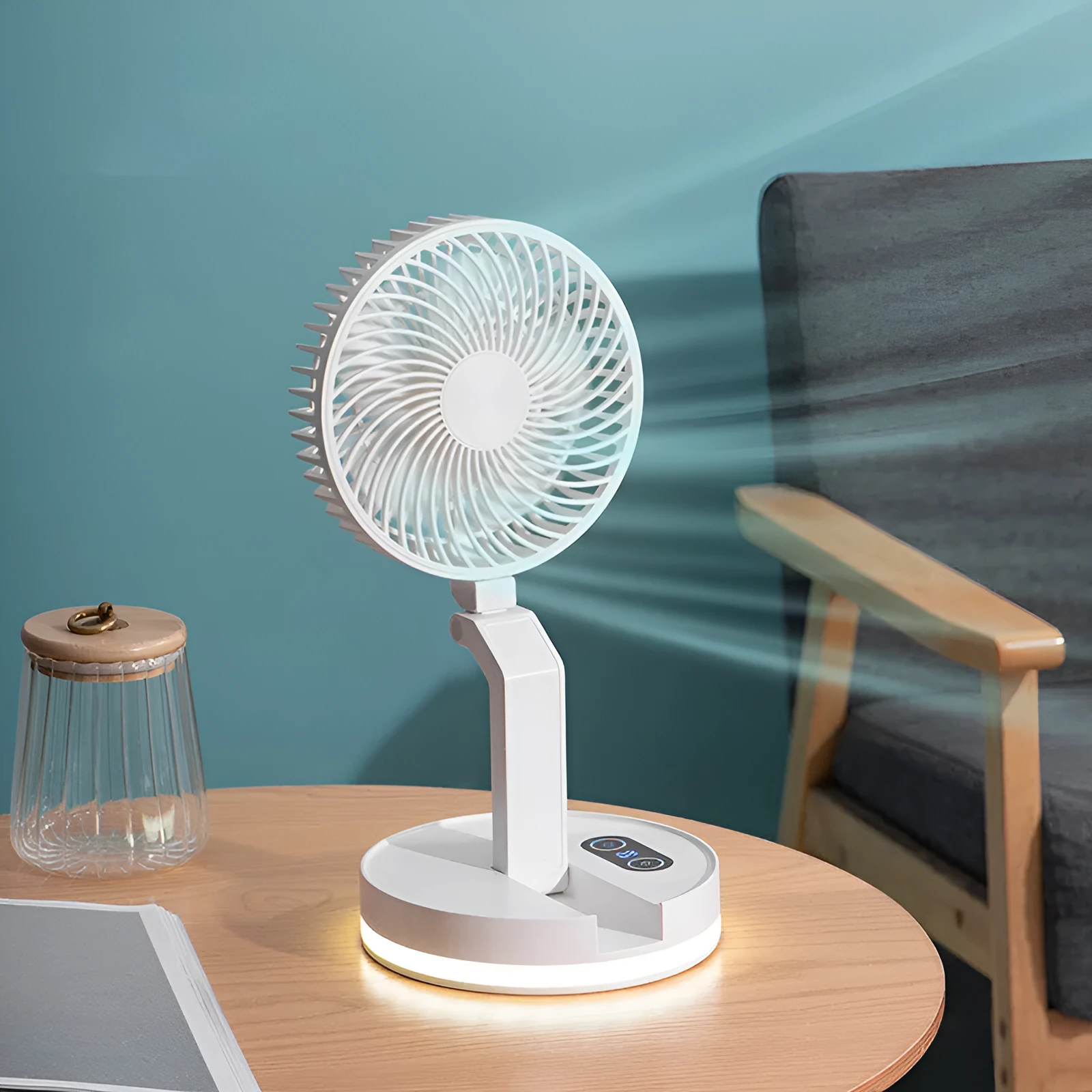 White folding USB rechargeable fan with 7 blades and remote control placed on a table