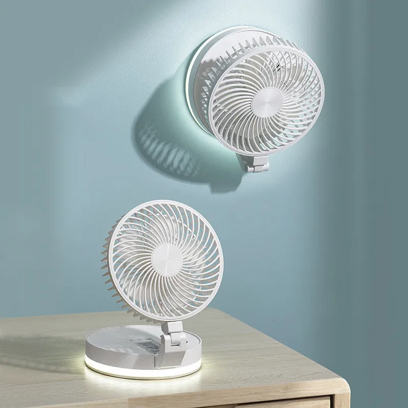 White folding USB rechargeable fan with 7 blades and remote control placed on a table