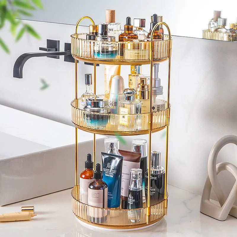 Three-layer rotating bathroom cosmetics storage rack in green, yellow, and white on a desktop