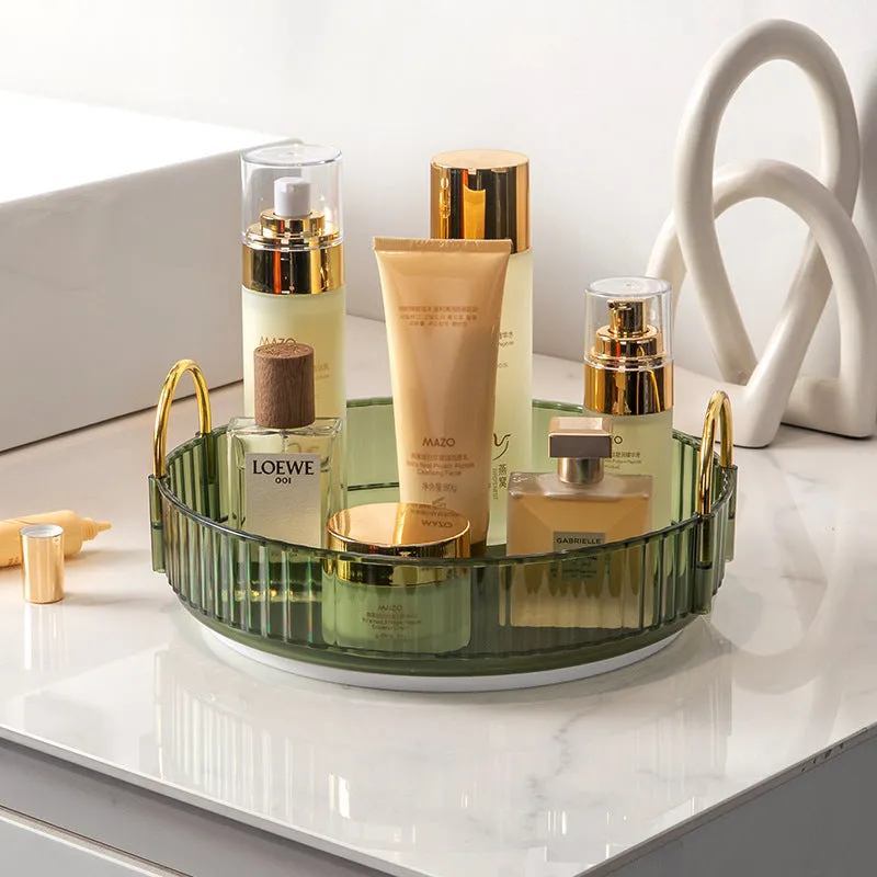 Three-layer rotating bathroom cosmetics storage rack in green, yellow, and white on a desktop