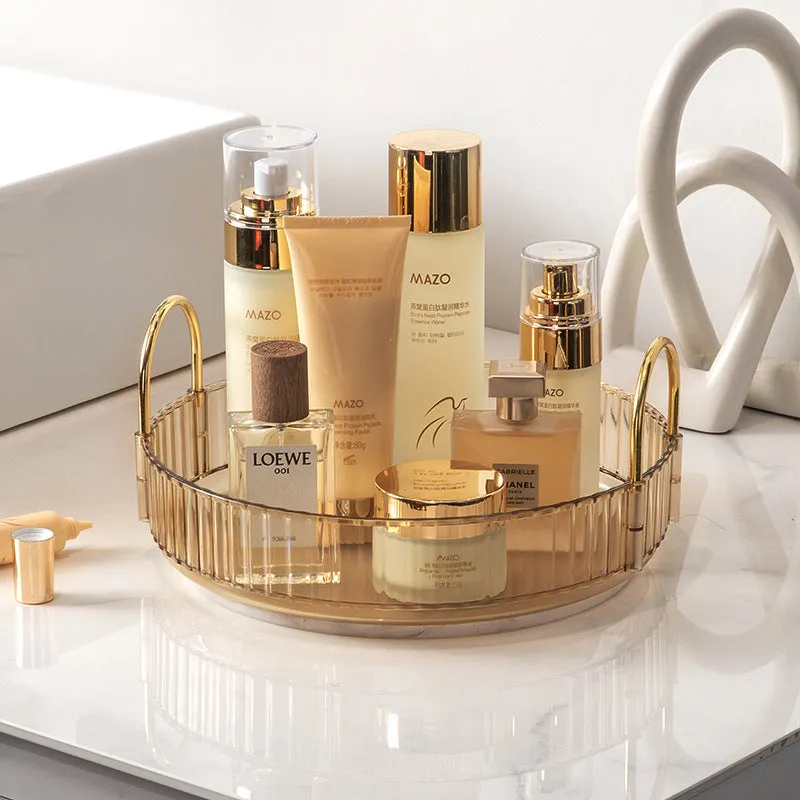 Three-layer rotating bathroom cosmetics storage rack in green, yellow, and white on a desktop