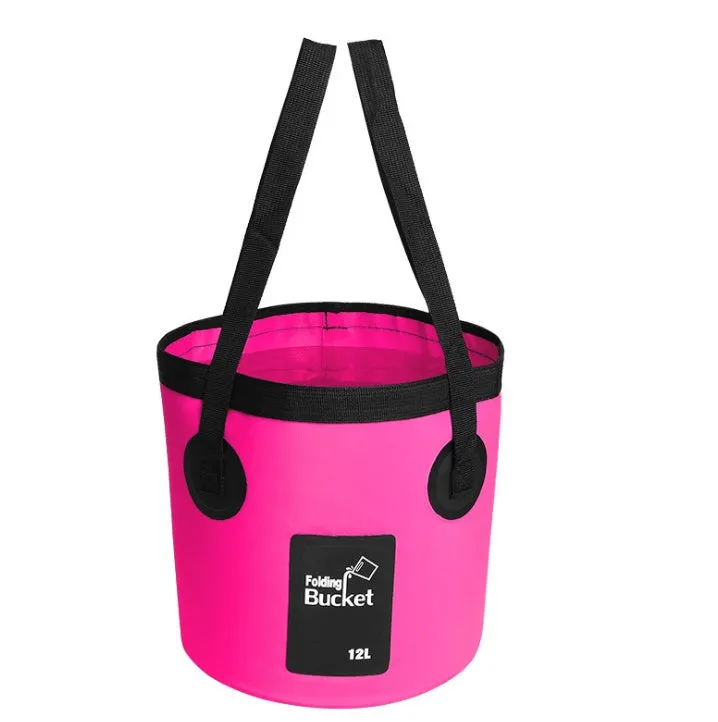 Yellow 20L folding PVC tarpaulin bucket open and standing on grass with water inside