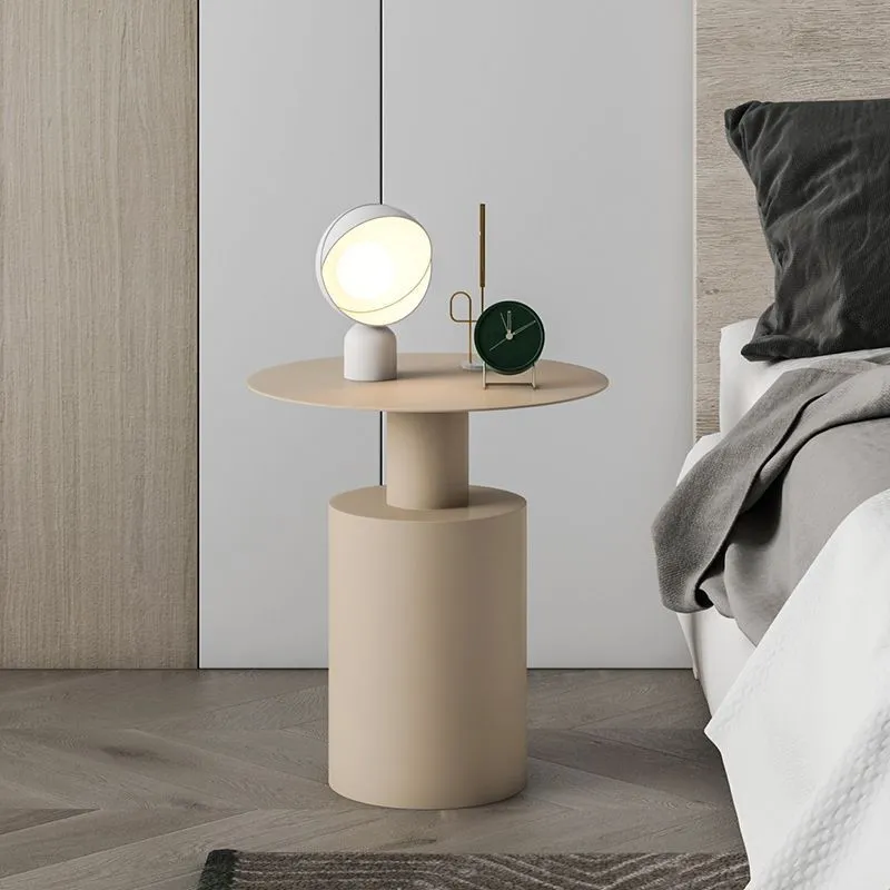 Nordic style round metal bedside table in beige with simple modern design for bedroom use