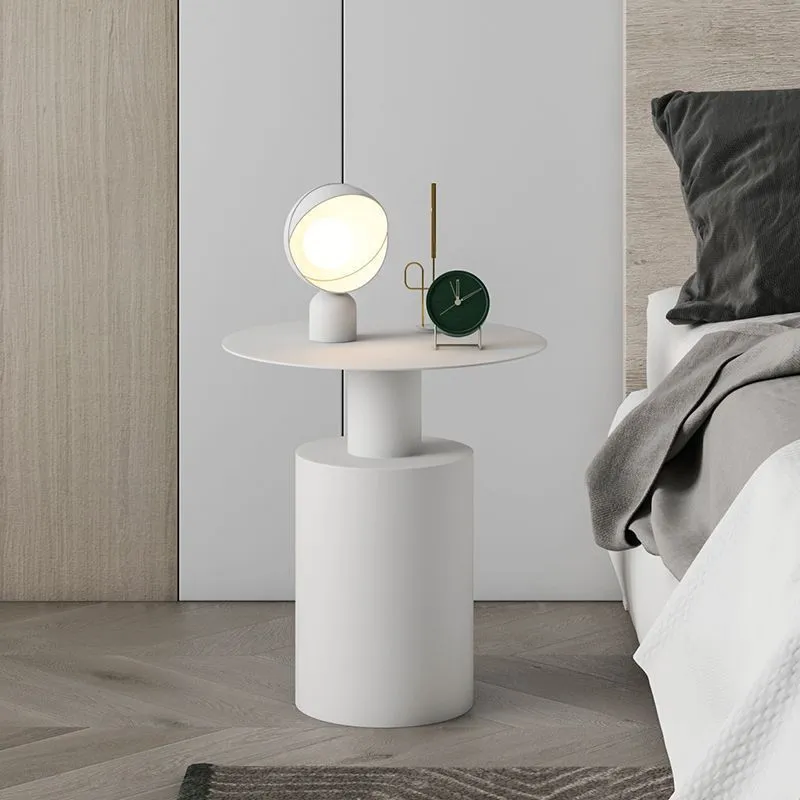 Nordic style round metal bedside table in beige with simple modern design for bedroom use