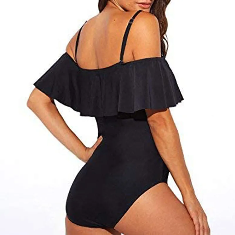Black one-piece women's swimsuit with cut-out design and ruffled tube top straps
