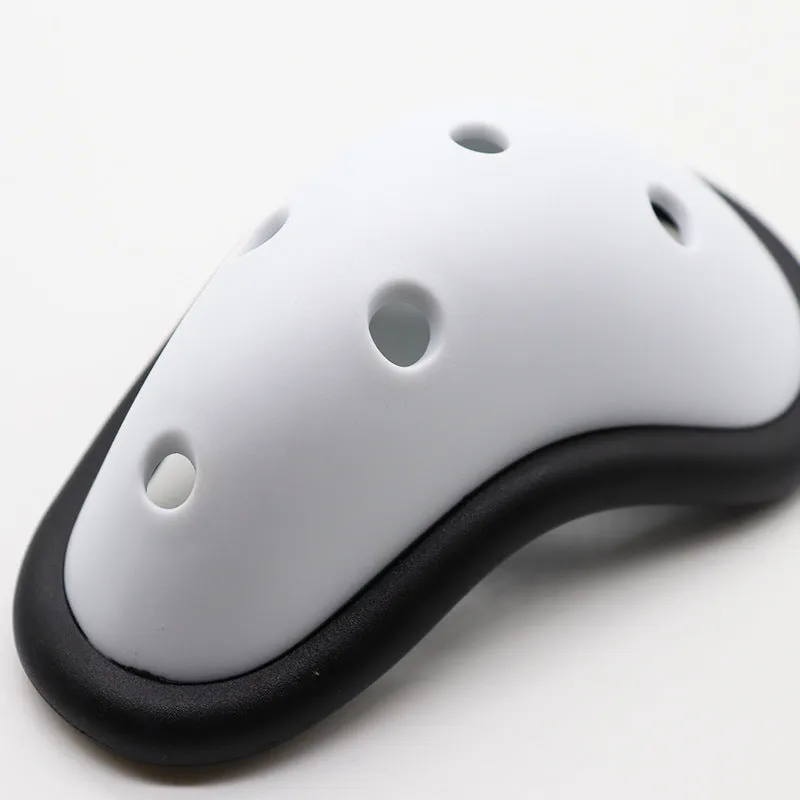 Rubber sports genital protector groin guard for adult and child sizes, used in boxing rugby hockey and martial arts.