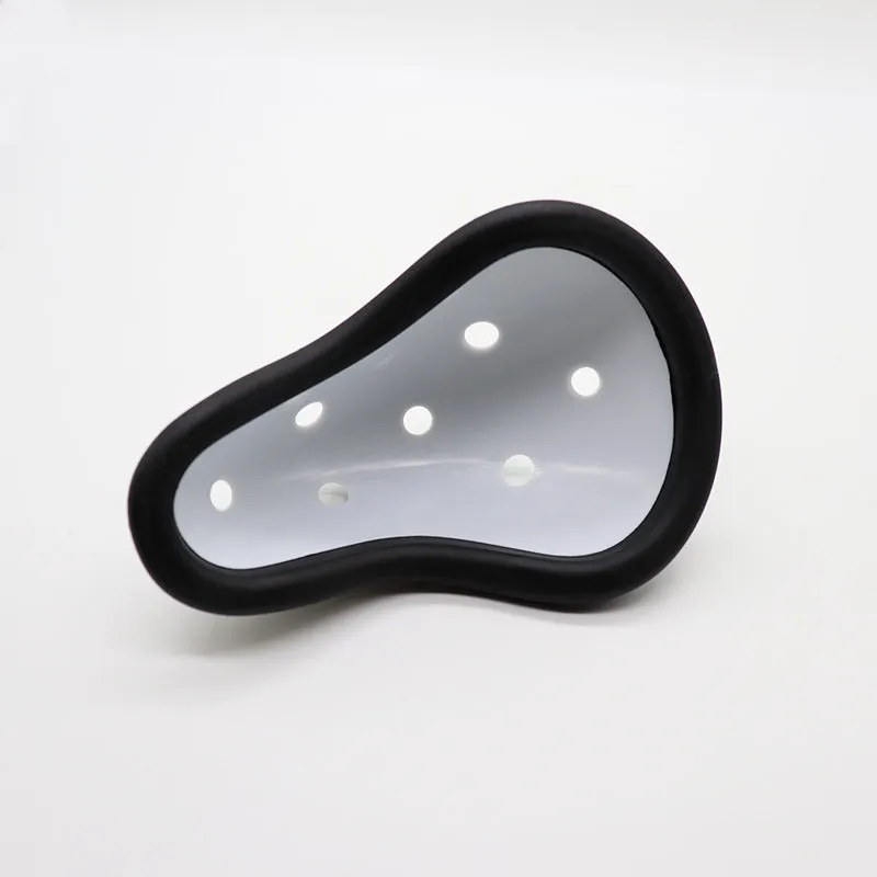 Rubber sports genital protector groin guard for adult and child sizes, used in boxing rugby hockey and martial arts.
