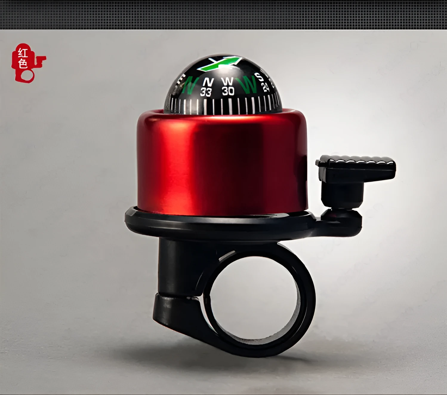 Bicycle compass bell in red mounted on handlebar with compass visible on ring