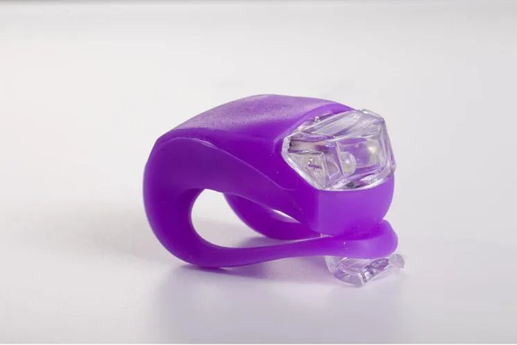 LED bike safety light with flexible silicone body and clip-on attachment in multiple colours