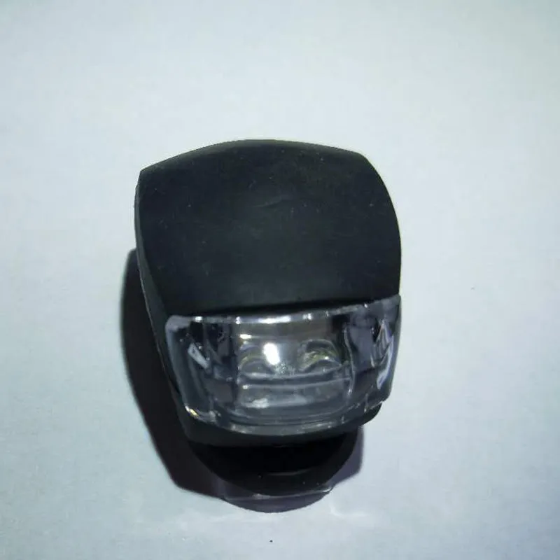 LED bike safety light with flexible silicone body and clip-on attachment in multiple colours