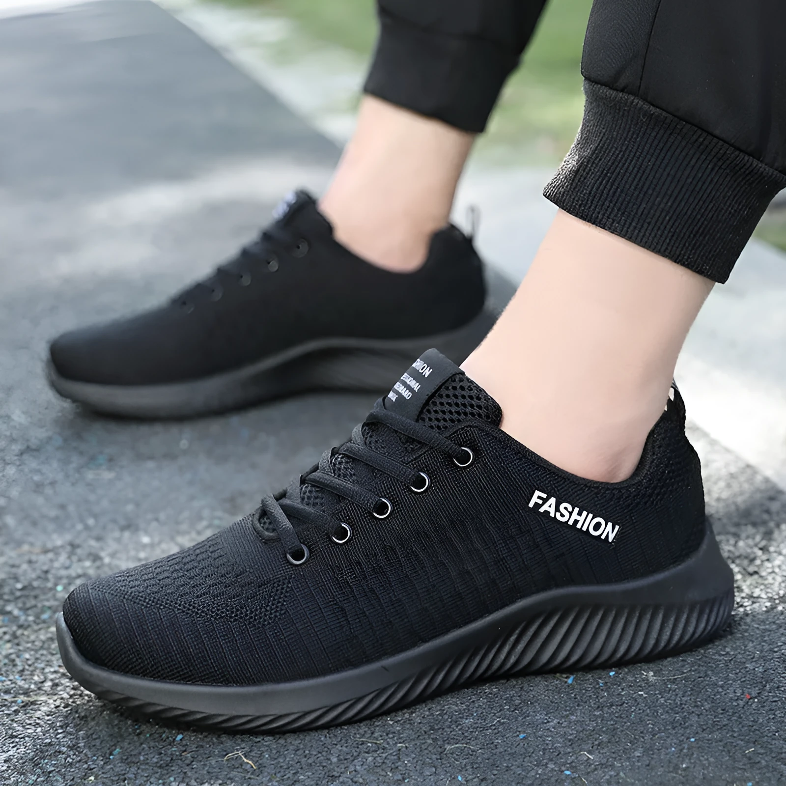 Men's lightweight mesh and PVC casual sports shoes in black, breathable for everyday wear