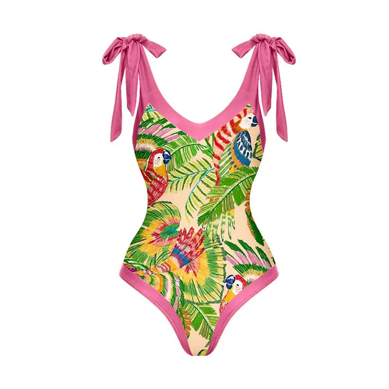 Retro pink floral print one-piece swimsuit with V-neck, thin skirt, and covered belly design.