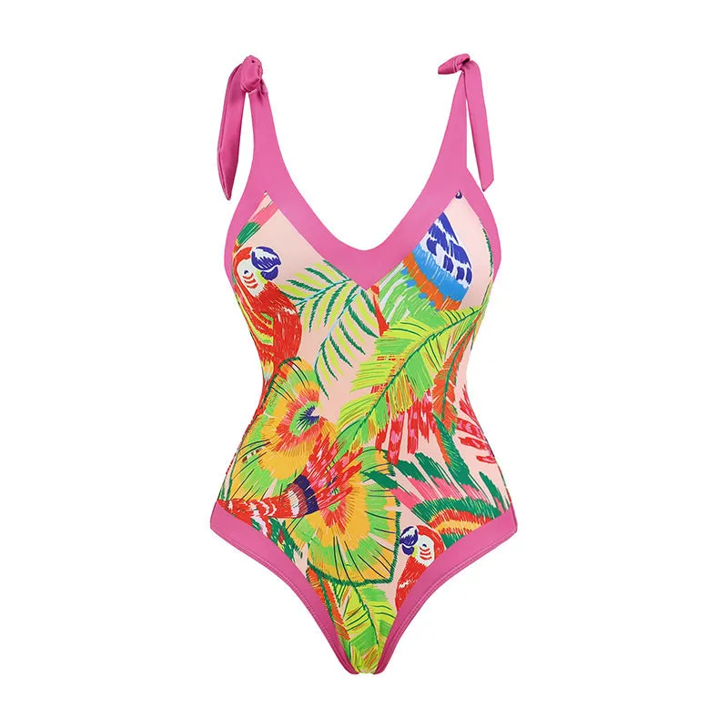 Retro pink floral print one-piece swimsuit with V-neck, thin skirt, and covered belly design.