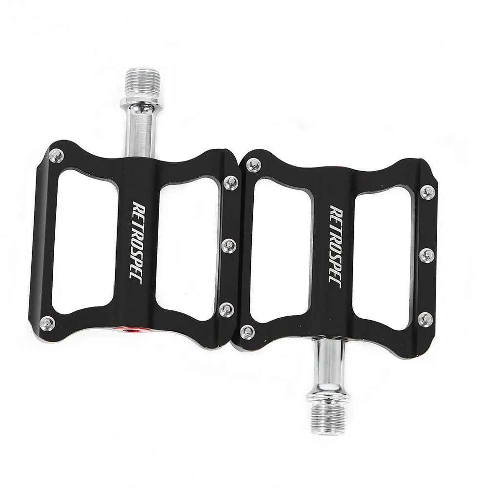 Pair of black aluminium CNC machined mountain bike pedals with anti-skid nails sealed bearing
