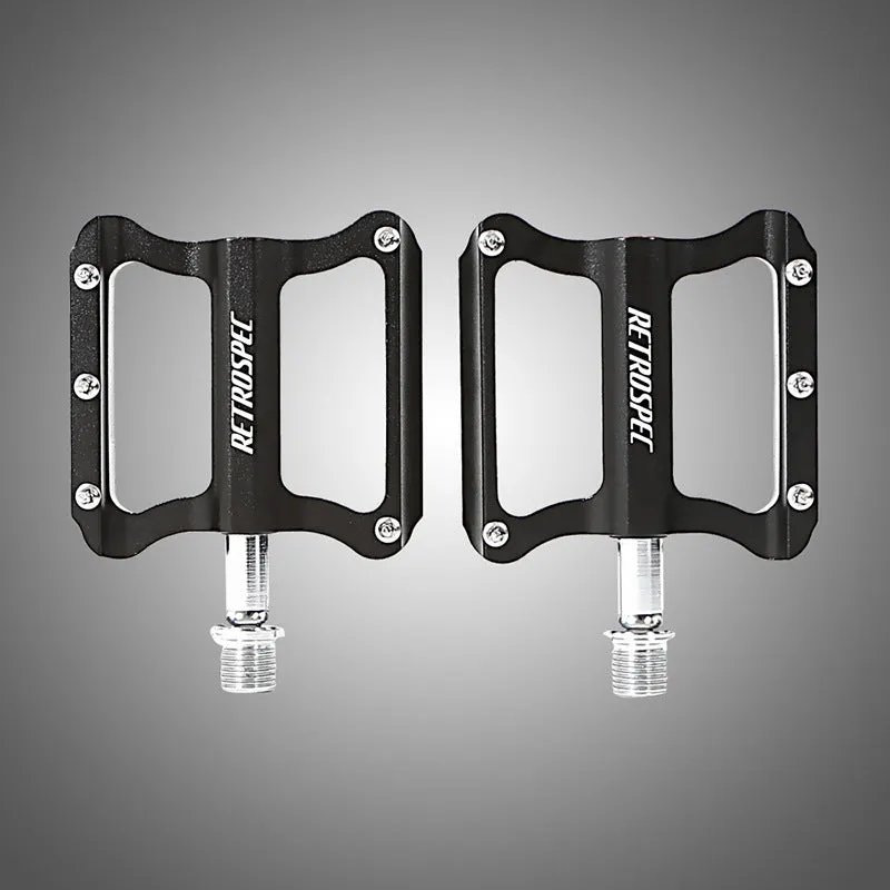Pair of black aluminium CNC machined mountain bike pedals with anti-skid nails sealed bearing