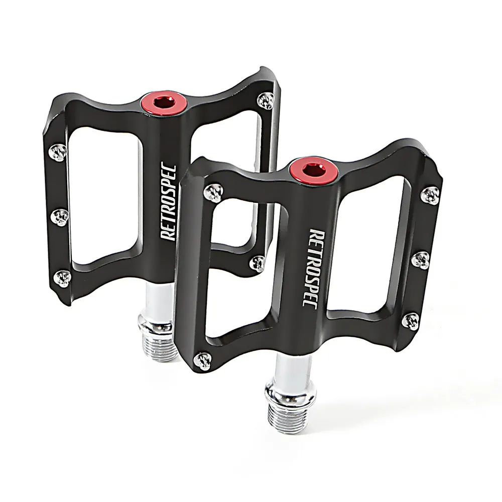 Pair of black aluminium CNC machined mountain bike pedals with anti-skid nails sealed bearing