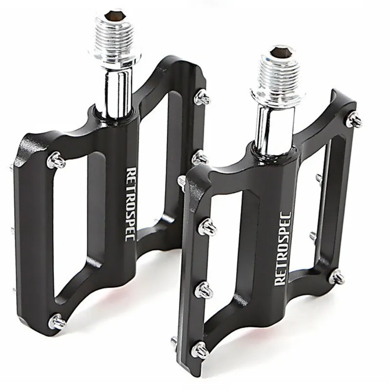 Pair of black aluminium CNC machined mountain bike pedals with anti-skid nails sealed bearing
