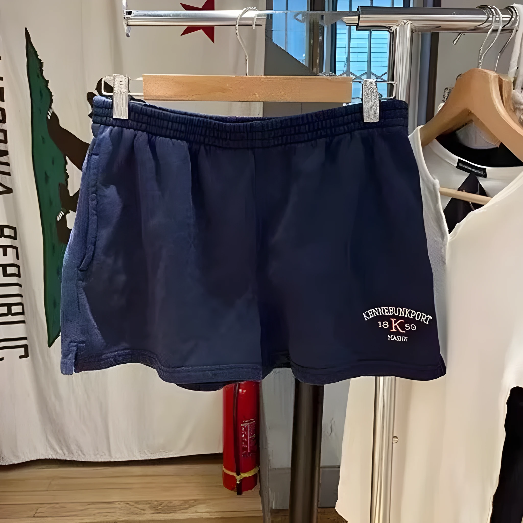 Dark blue cotton high top sports shorts for women with white flag embroidery