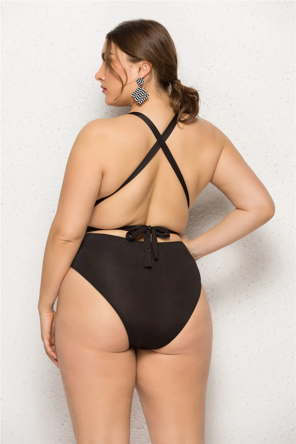 Plus size women's black one-piece backless swimsuit with high elasticity fabric and chest pads