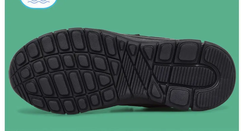 Boys' black waterproof sports shoes with mesh upper and round toe design on light background