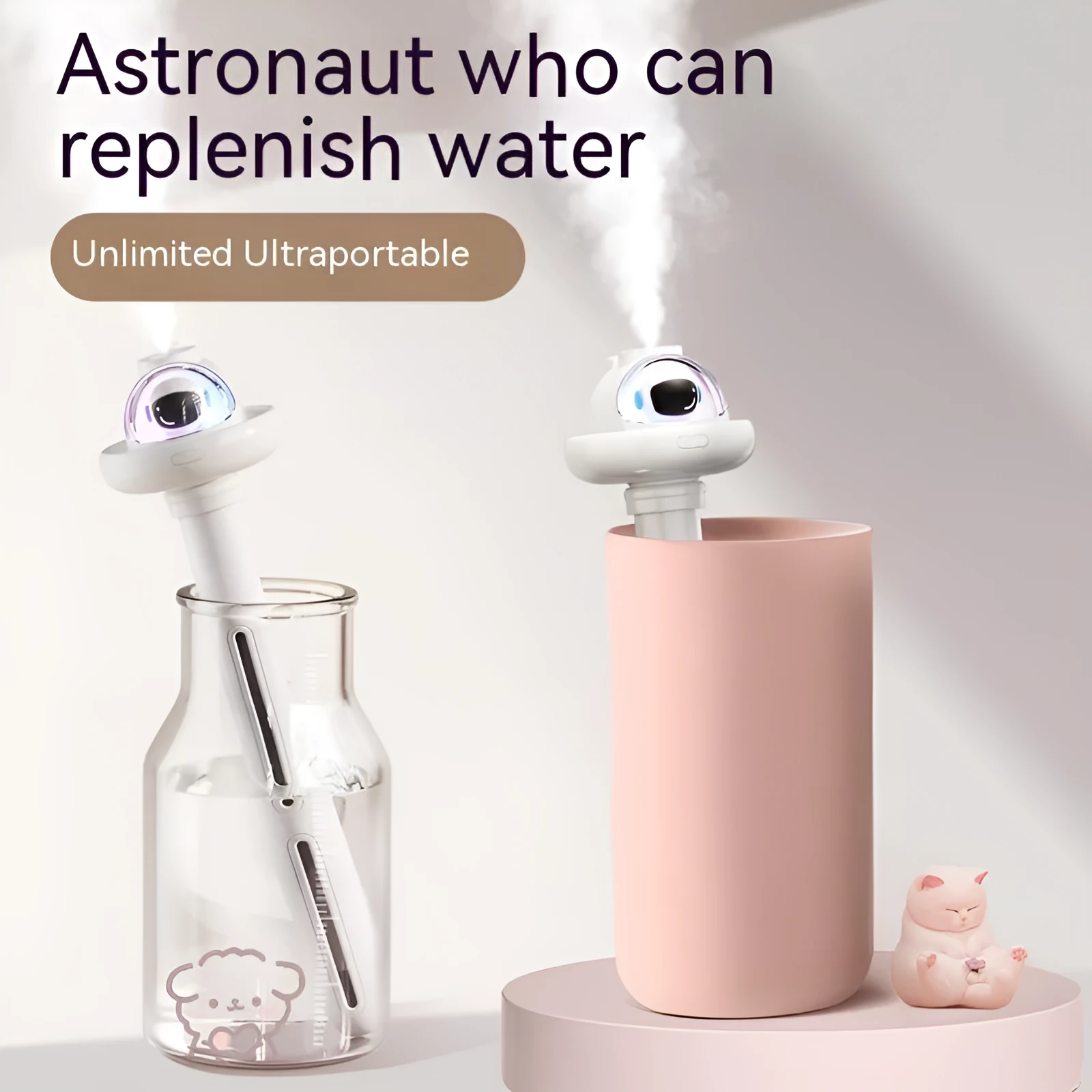 Small white plastic astronaut humidifier with USB cable on desk