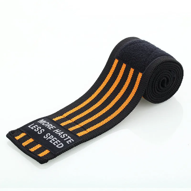 Weightlifting strength wristband in blue nylon with adjustable strap on gym floor