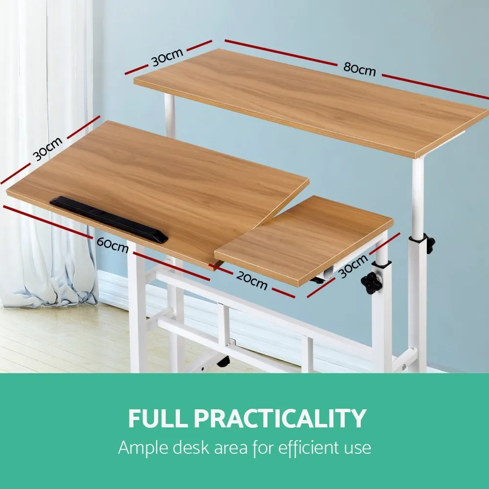Mobile computer lifting foldable standing desk in walnut colour with plate material construction for bedroom or bedside use