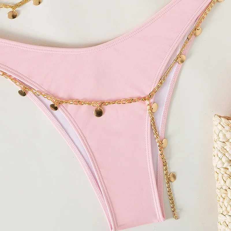 Women's solid colour bikini set in grass green, showing bra top and panty bottom on a plain background