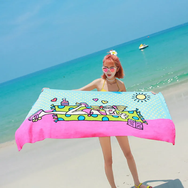 Flower-coloured swimming absorbent microfiber towel 150x70cm on a beach background