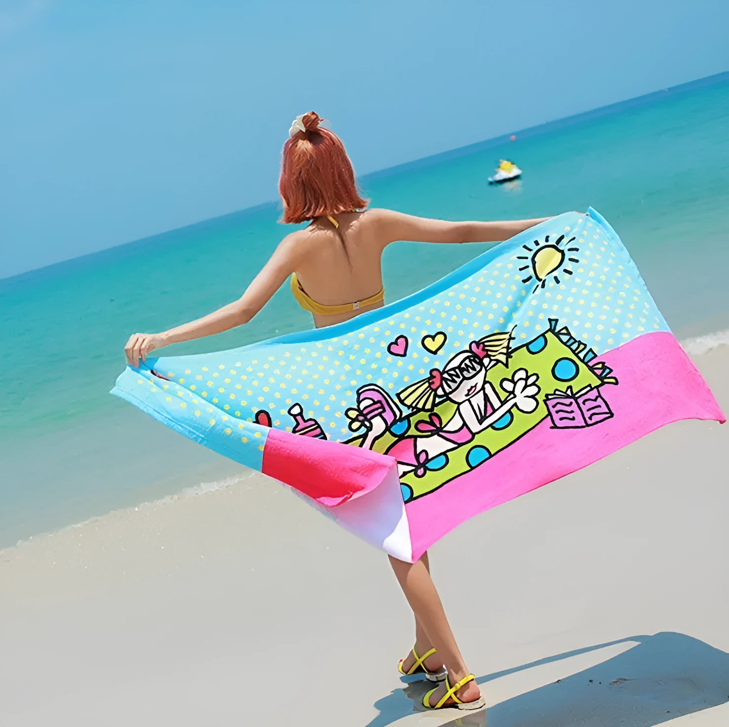 Flower-coloured swimming absorbent microfiber towel 150x70cm on a beach background
