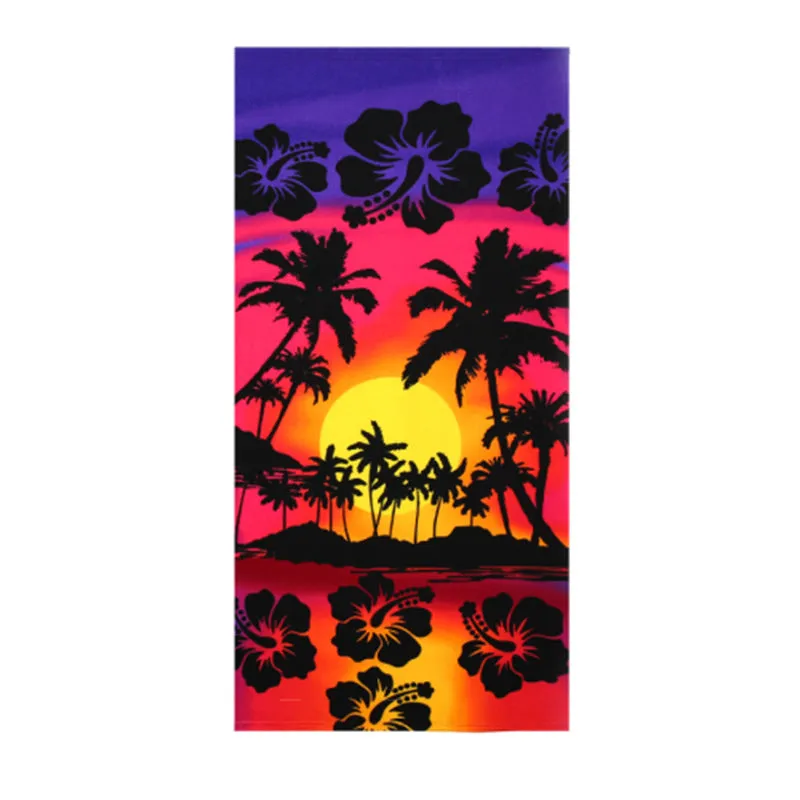 Flower-coloured swimming absorbent microfiber towel 150x70cm on a beach background