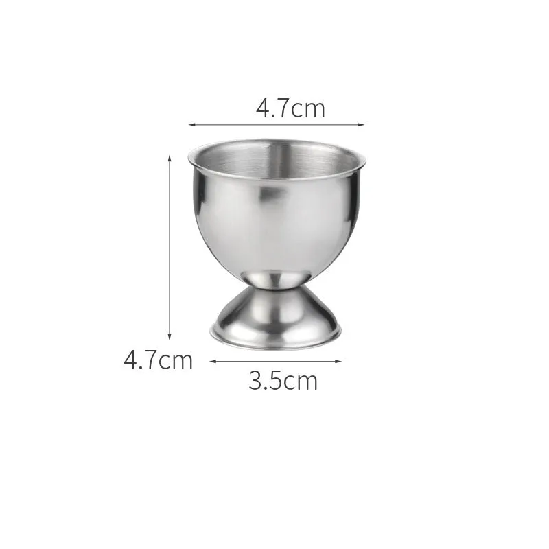 Creative stainless steel egg bracket in silver finish, holding eggs on a kitchen countertop.