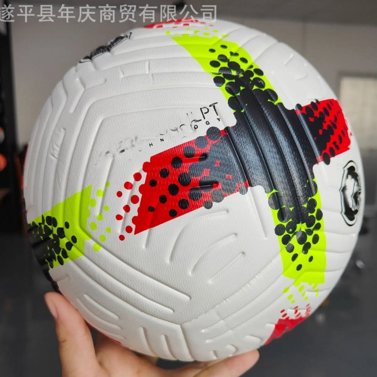 Fluorescent green Size 5 football with seamless construction for training and multi-sport use