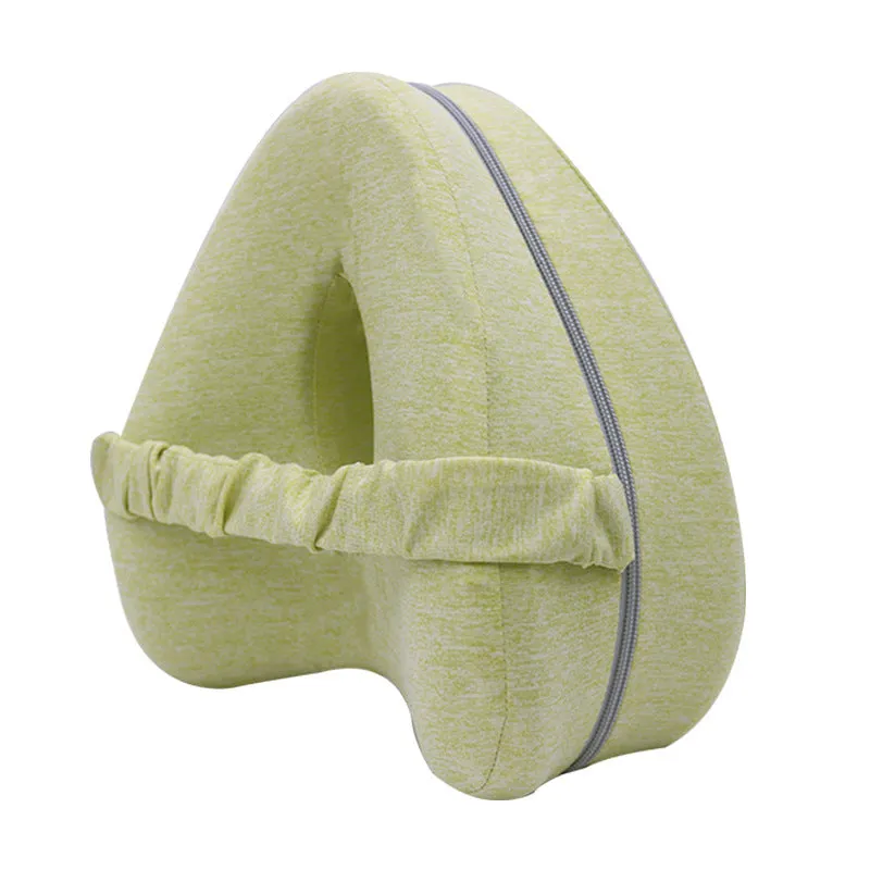 Heart-shaped dark blue memory foam leg pillow for adult use.