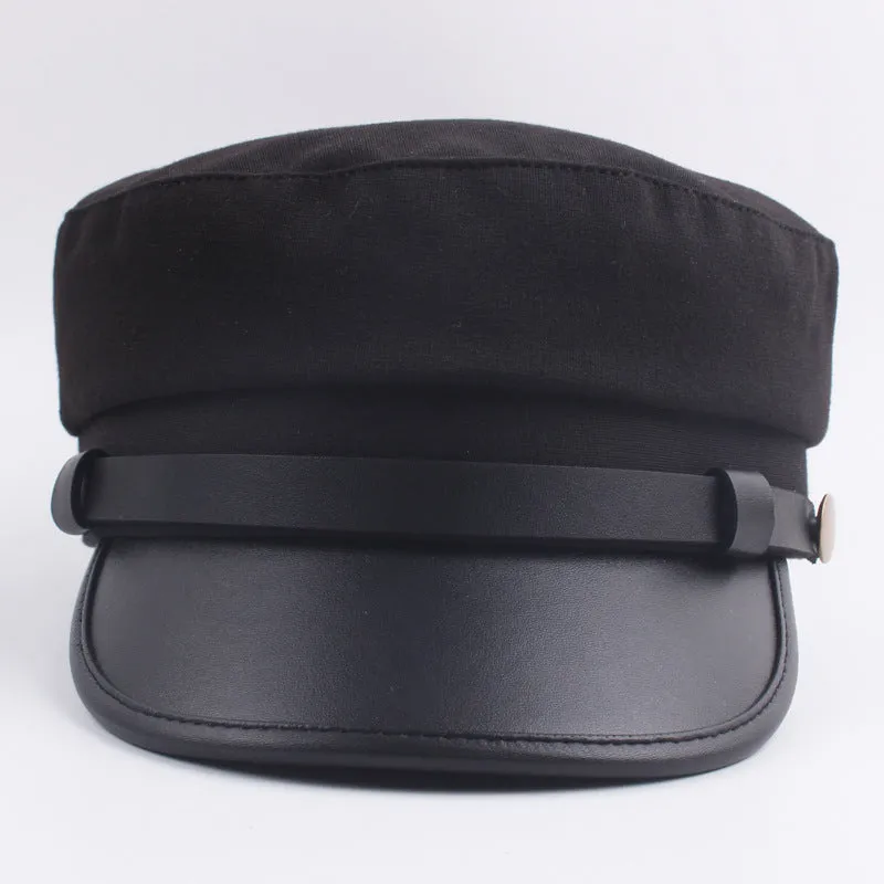 Navy imitation leather flat brim peaked cap with dome crown on white background