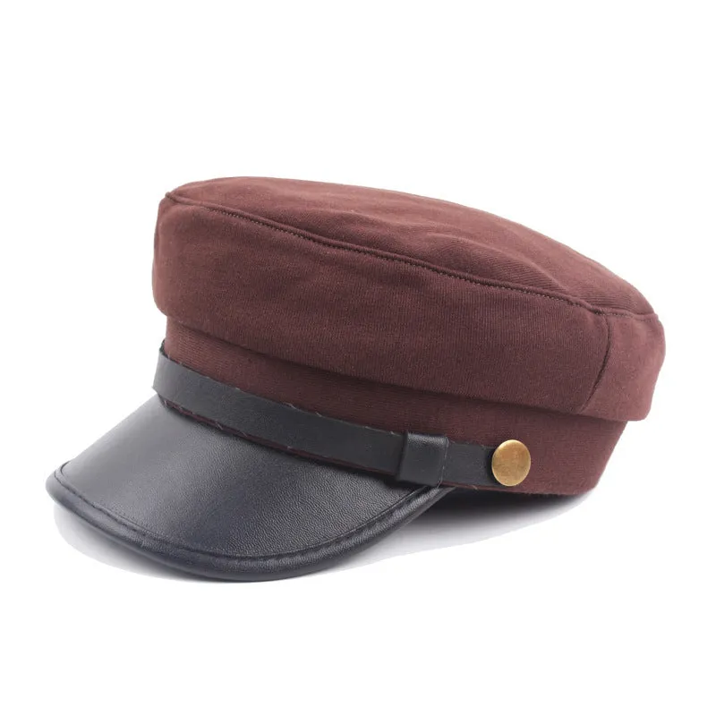 Navy imitation leather flat brim peaked cap with dome crown on white background