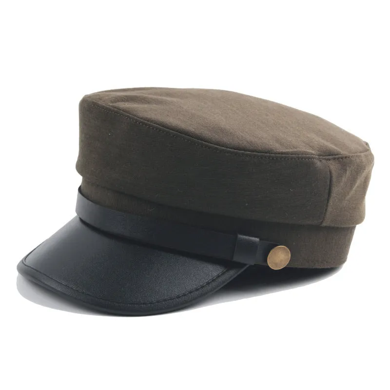 Navy imitation leather flat brim peaked cap with dome crown on white background