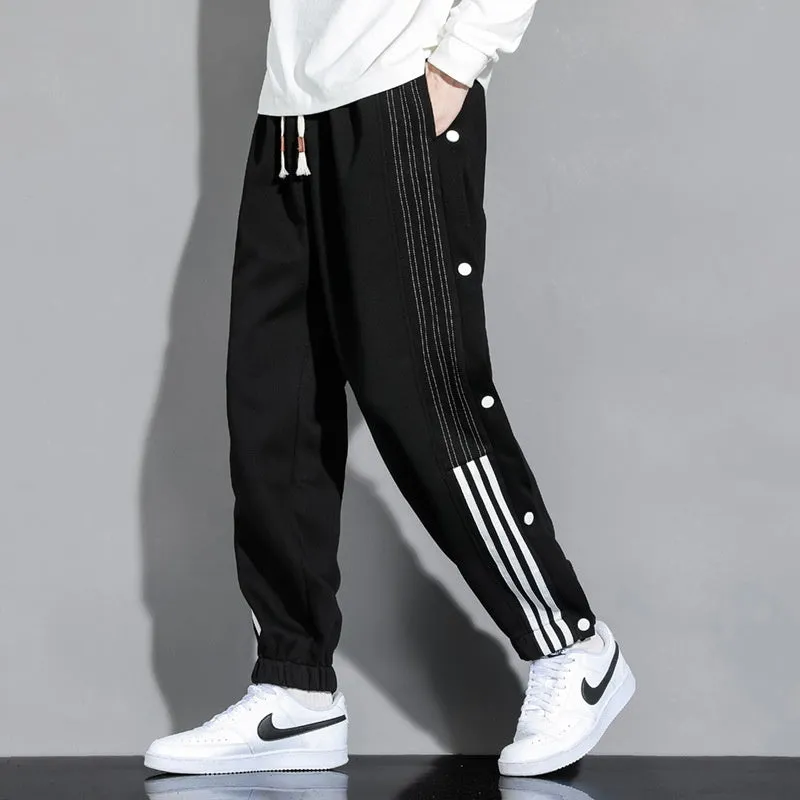 Men's loose black sweatpants with ankle ties and high elastic waistband for sports