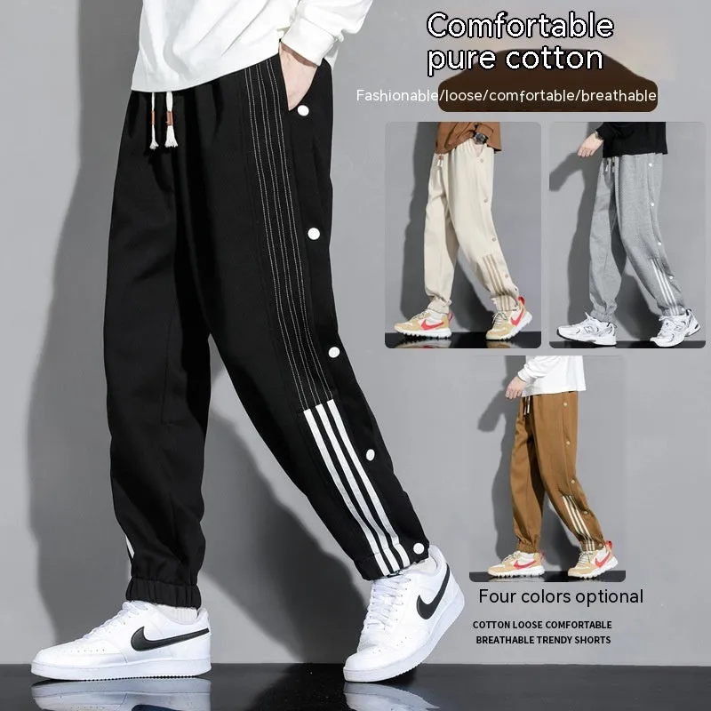 Men's loose black sweatpants with ankle ties and high elastic waistband for sports