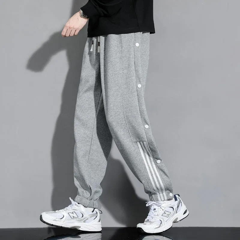Men's loose black sweatpants with ankle ties and high elastic waistband for sports