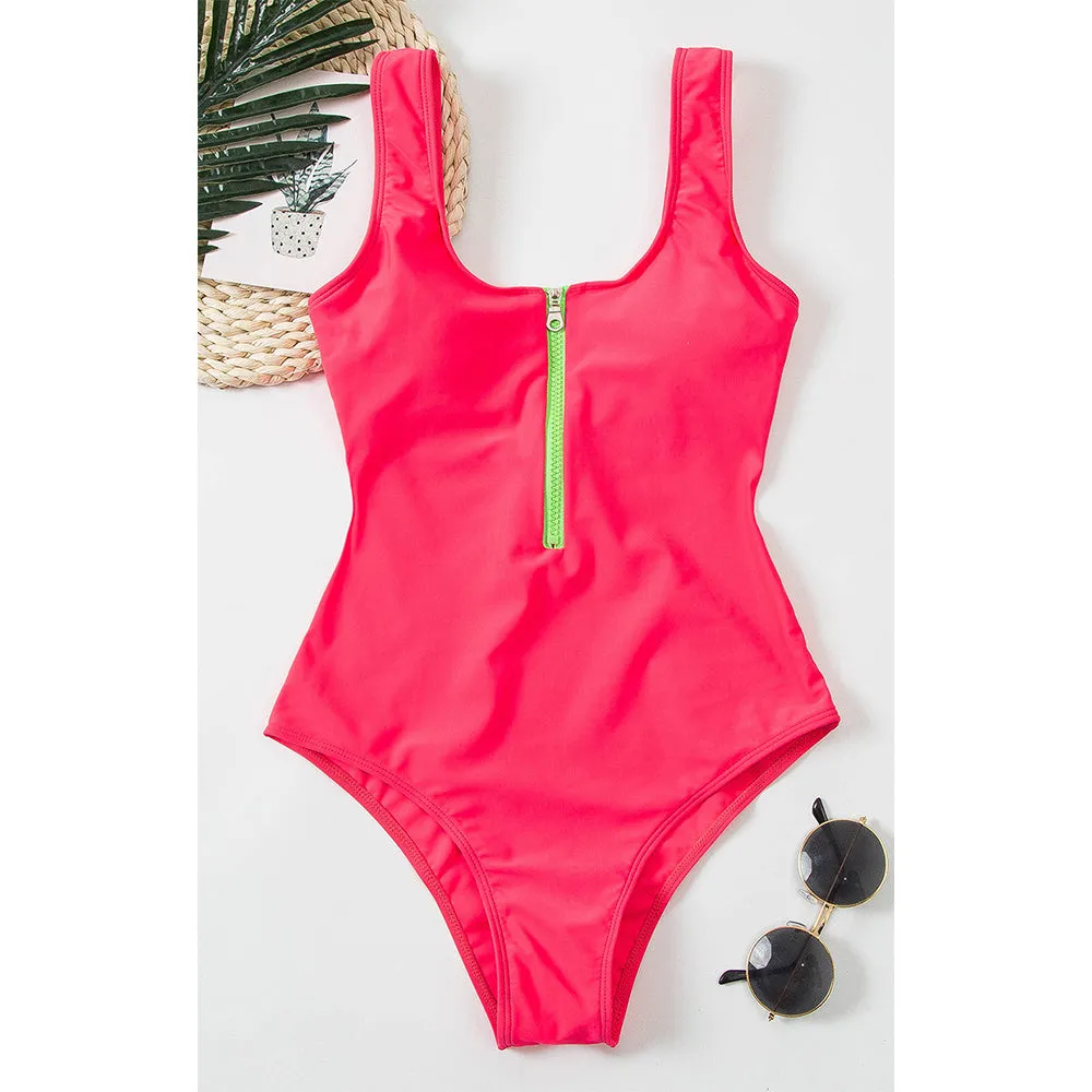 Ladies one-piece zipper printed nylon swimsuit in white with full front zip, side view on model
