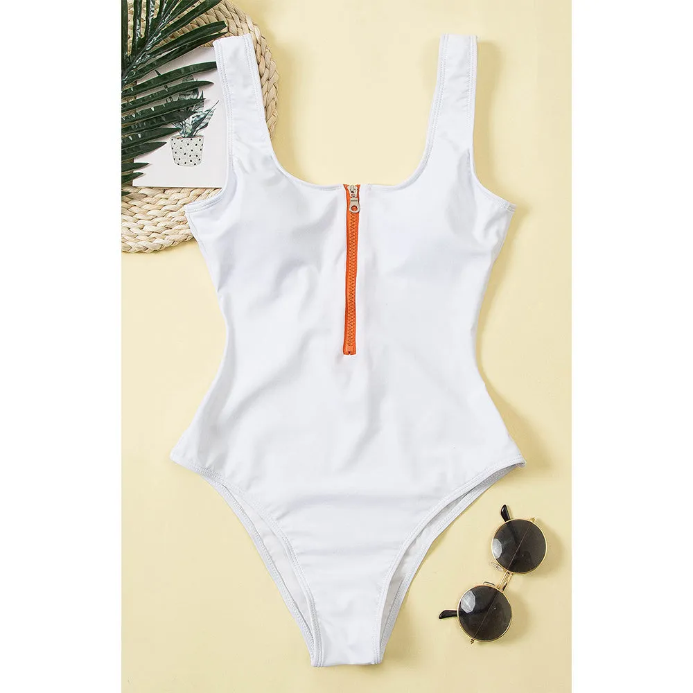 Ladies one-piece zipper printed nylon swimsuit in white with full front zip, side view on model
