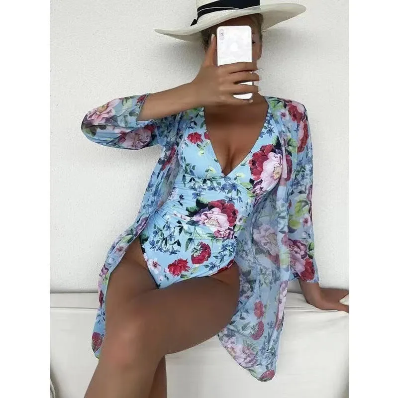 Women's floral patterned bikini and matching coat set in one of seven colour options.