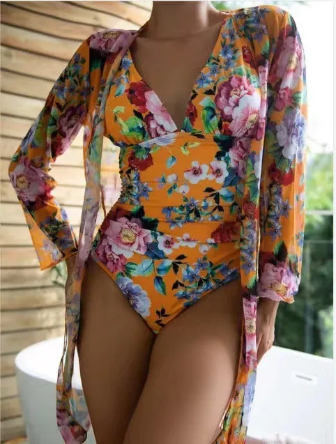 Women's floral patterned bikini and matching coat set in one of seven colour options.