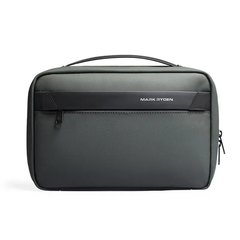 Black Oxford cloth toiletries bag with multiple compartments open, showing wet-dry separation design.