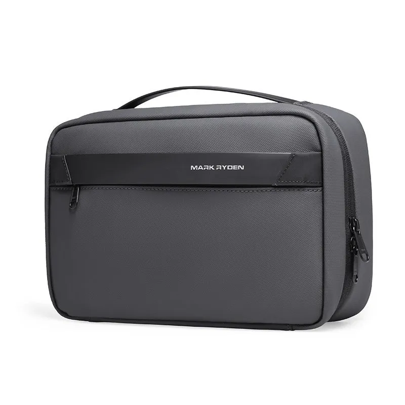Black Oxford cloth toiletries bag with multiple compartments open, showing wet-dry separation design.