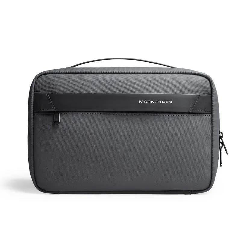 Black Oxford cloth toiletries bag with multiple compartments open, showing wet-dry separation design.